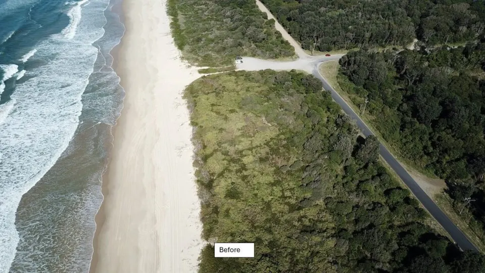 Aerial view of coastal dune vegetation, beach and road before bitou bush drone spraying